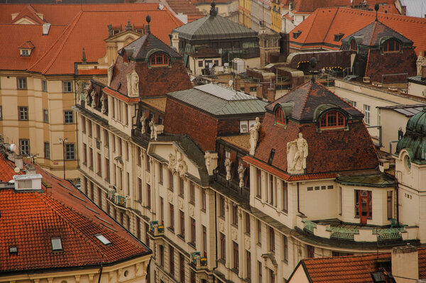 Prague Old Town Square row houses with traditional red roofs in the Czech Republic