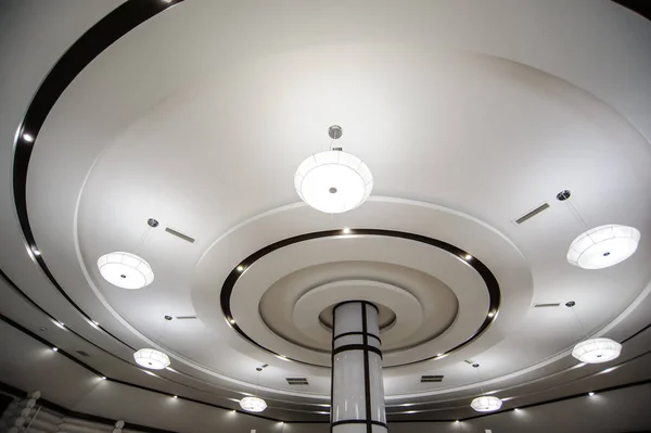 Round ceiling with modern white ceiling lights