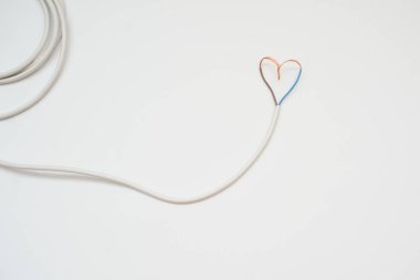 The white wire in the form of heart