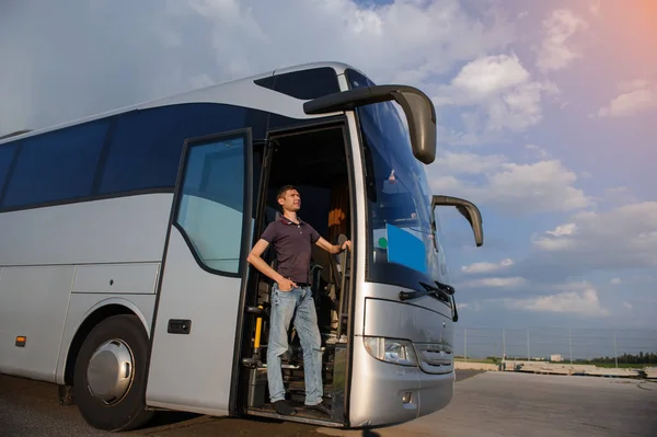 Driver staying in the front door of his bus