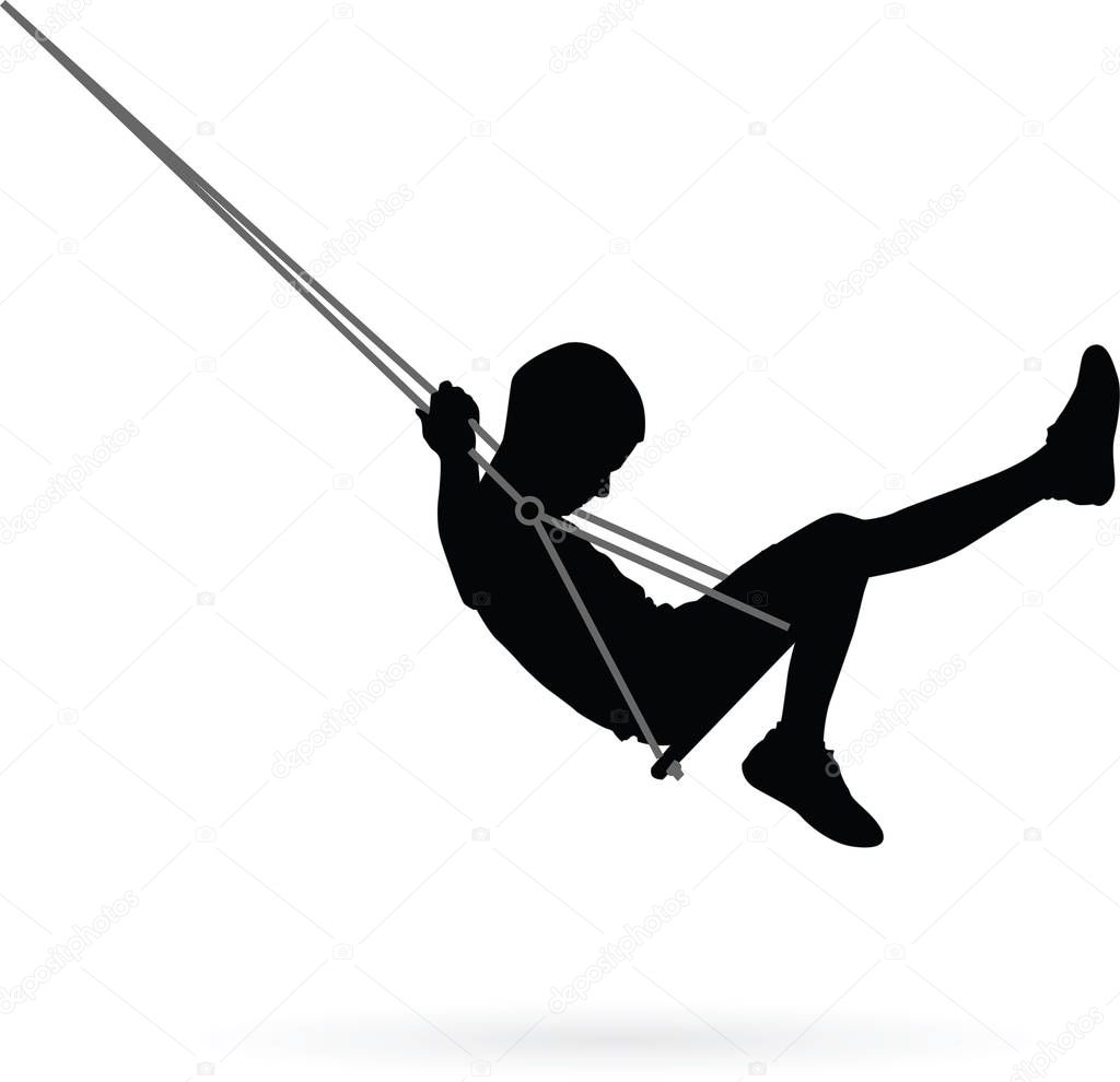 Boy swinging on a swing