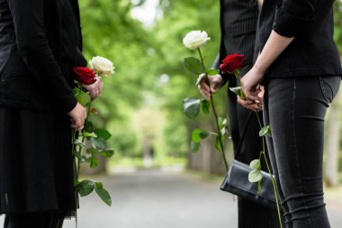 Family in guard of honor at funeral clipart