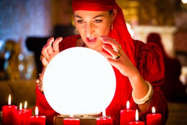 Fortuneteller at Seance or session with Crystal ball clipart