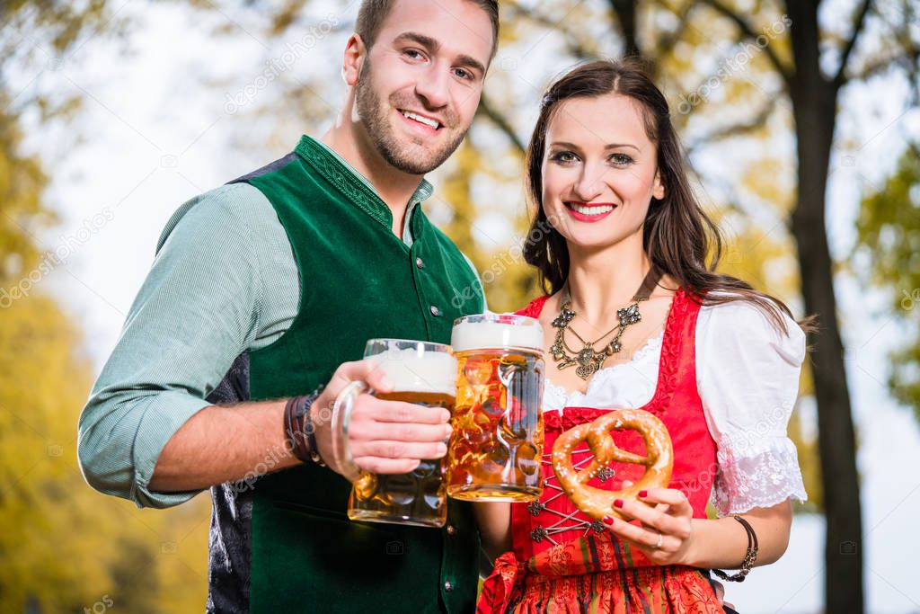 Bavarians in Tracht with Beer