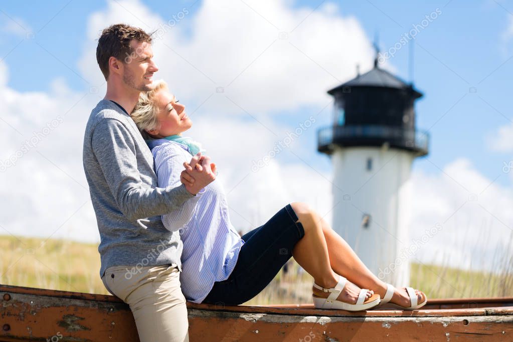 Couple enjoying holiday in beach dune