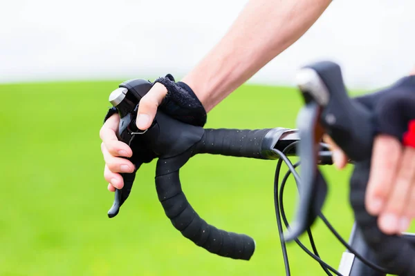 stock image Sport man having Hands on handlebar of racing bike