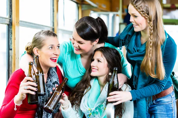 Group of people in tram bar having beer party — Stock Photo, Image