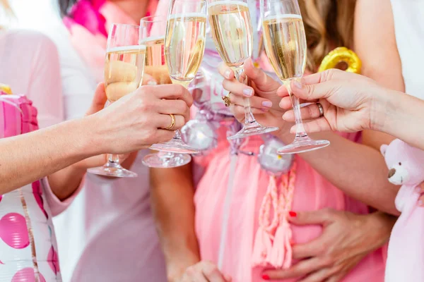 Friends clinking glasses on baby shower party — Stock Photo, Image