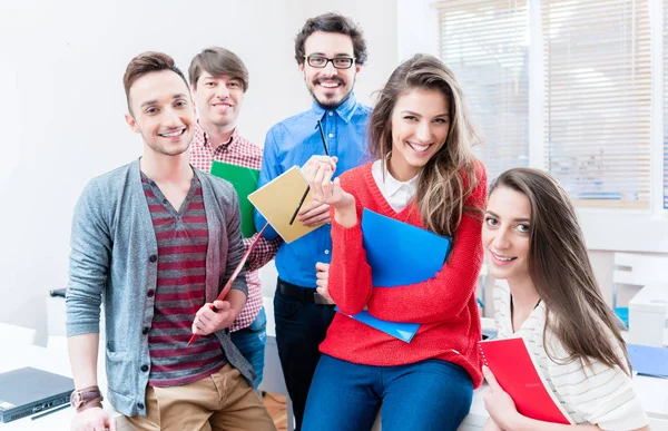 Students in College or university learning together — Stock Photo, Image