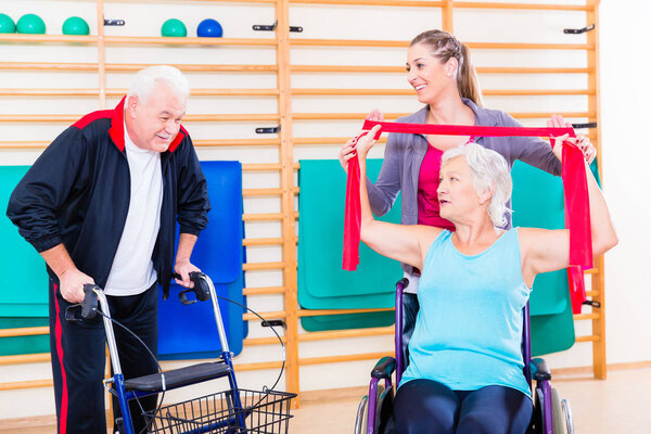 Seniors in physical rehabilitation therapy