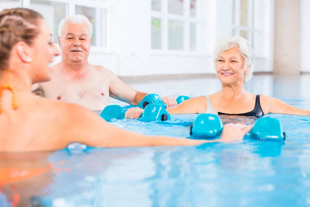 People at water gymnastics in physiotherapy