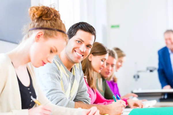 College students writing test — Stock Photo, Image