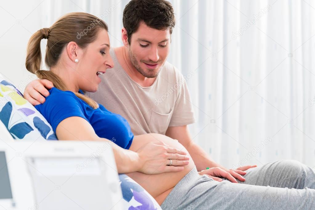 Pregnant woman in delivery room 
