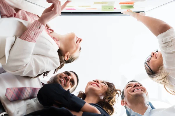 Group of business people in office at creative brainstorming — Stock Photo, Image