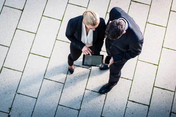 Business man and woman in top view — Stock Photo, Image