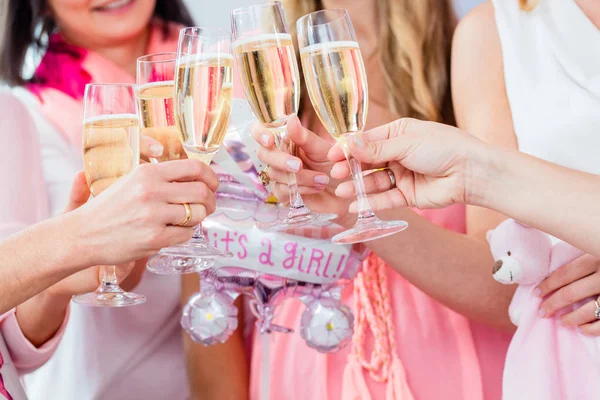Friends clinking glasses on baby shower party — Stock Photo, Image