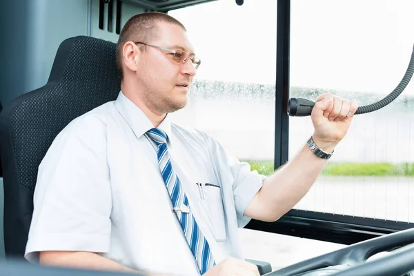 Bus driver making announcement — Stock Photo, Image