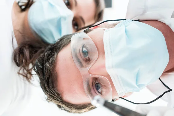 Dentist and nurse in dental office — Stock Photo, Image