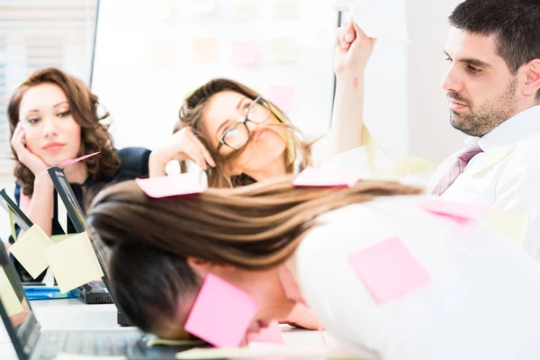Women and men in office being tired and frustrated — Stock Photo, Image
