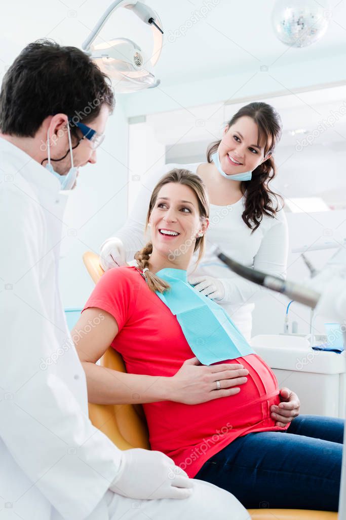 Pregnant woman at dentist 