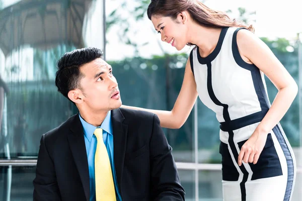 Asian Businesspeople with sexual harassment problem — Stock Photo, Image