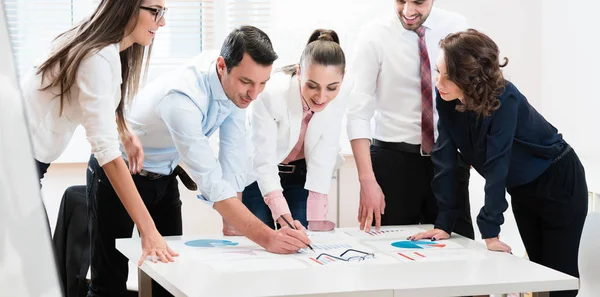 Financial consultants in bank analyzing data — Stock Photo, Image