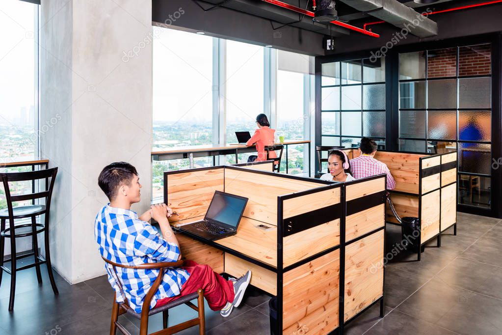Start-up business people in coworking office