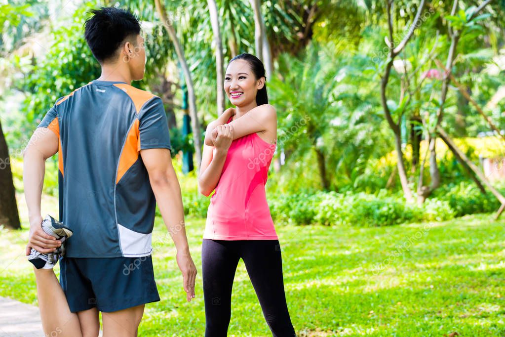 Outdoor watching asian couple