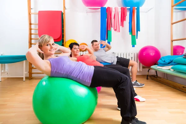 Patients at physiotherapy on training balls — Stock Photo, Image