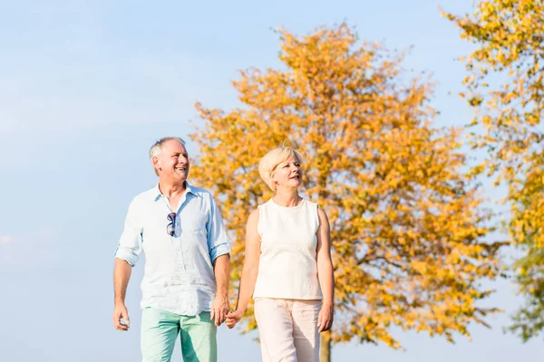 Senior couple having walk — Stock Photo, Image