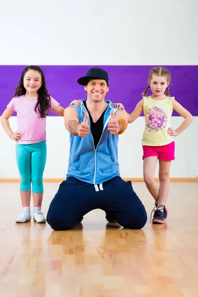 Dance teacher and kids