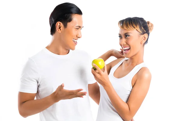 Asian couple with apple — Stock Photo, Image