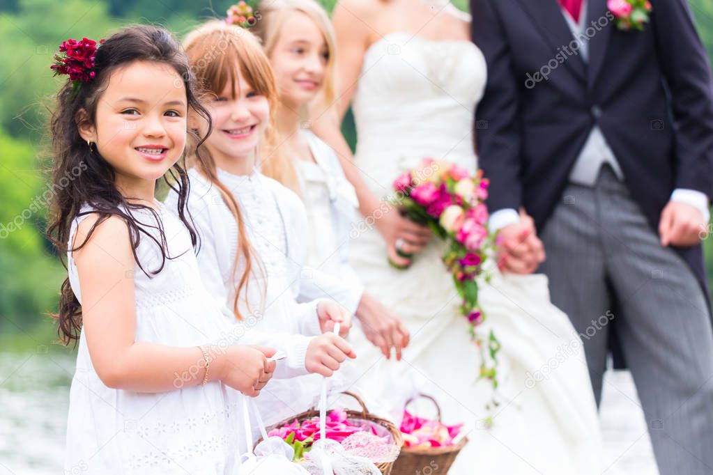 Wedding bridesmaids children with flower basket