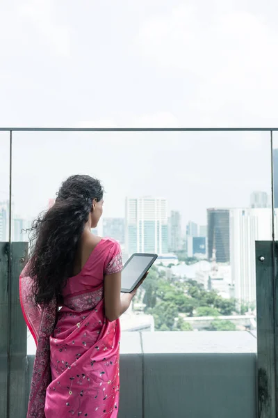 Young Indian woman using a tablet Pc — Stock Photo, Image