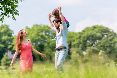 Family having picnic  clipart