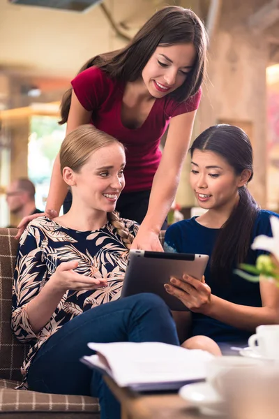 Young women looking on tablet — Stock Photo, Image