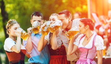 Group of young people drinking beer clipart