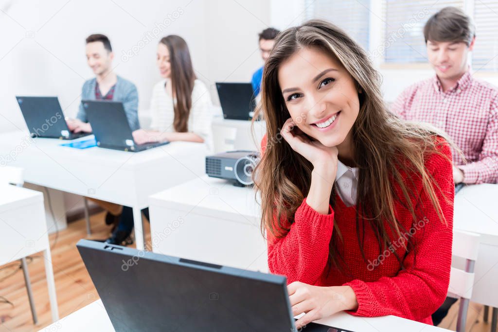 Student woman working on laptop