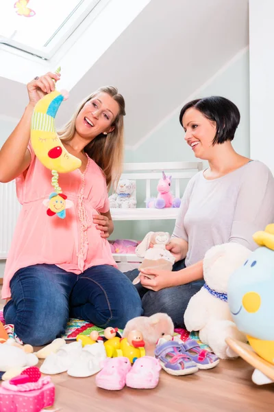 Pregnant woman with friend — Stock Photo, Image