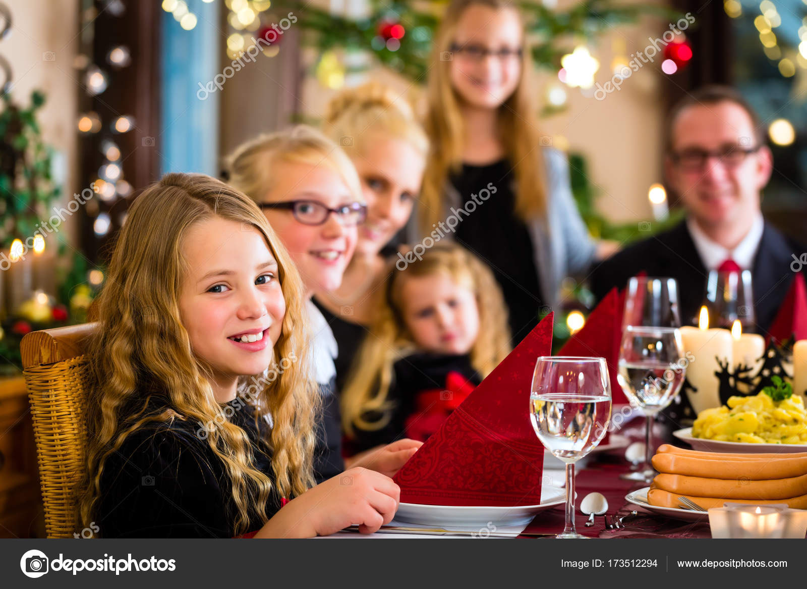 German Christmas Eve Dinner / Family Celebrating Christmas Dinner Stock