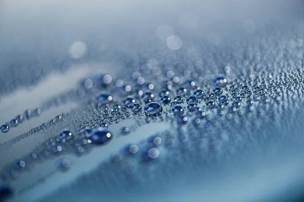 Water drops on metallic surface — Stock Photo, Image