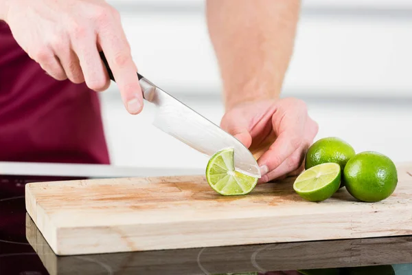 Cutting fruits for cooking — Stock Photo, Image