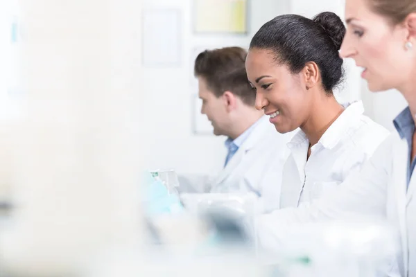 Group Researchers Smiling Work Devices Laboratory — Stock Photo, Image