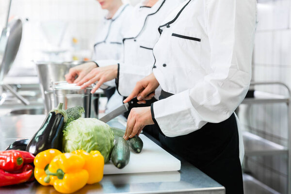 chefs preparing food