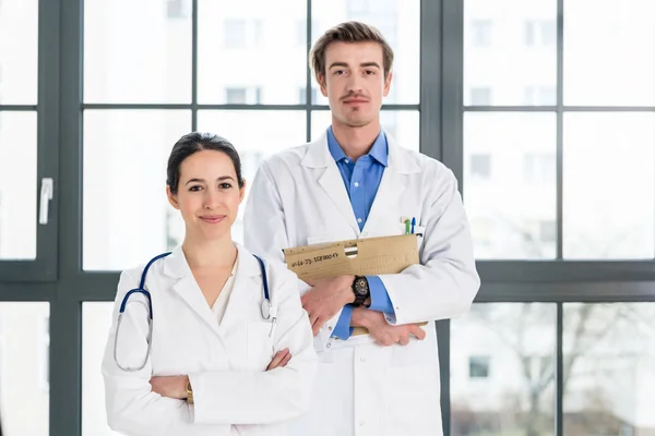 Portrait of two determined physicians looking at camera — Stock Photo, Image