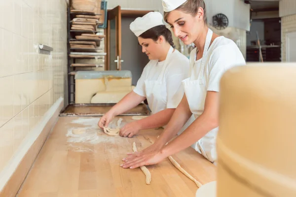 Women Bakery Forming Raw Dough Pretzels Later Baking — Stock Photo, Image