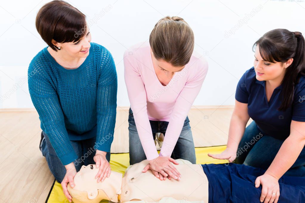 Group of women in first aid course