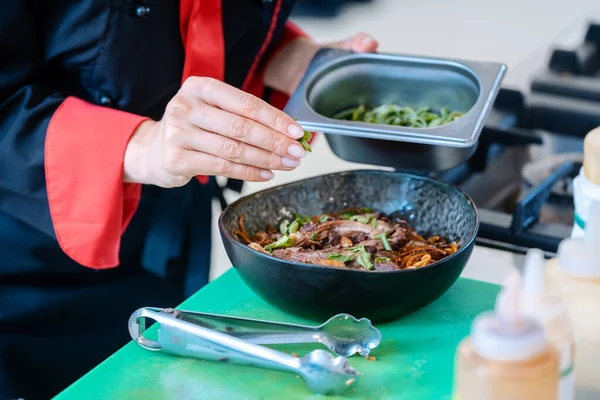 Chef stirring pasta — Stock Photo, Image