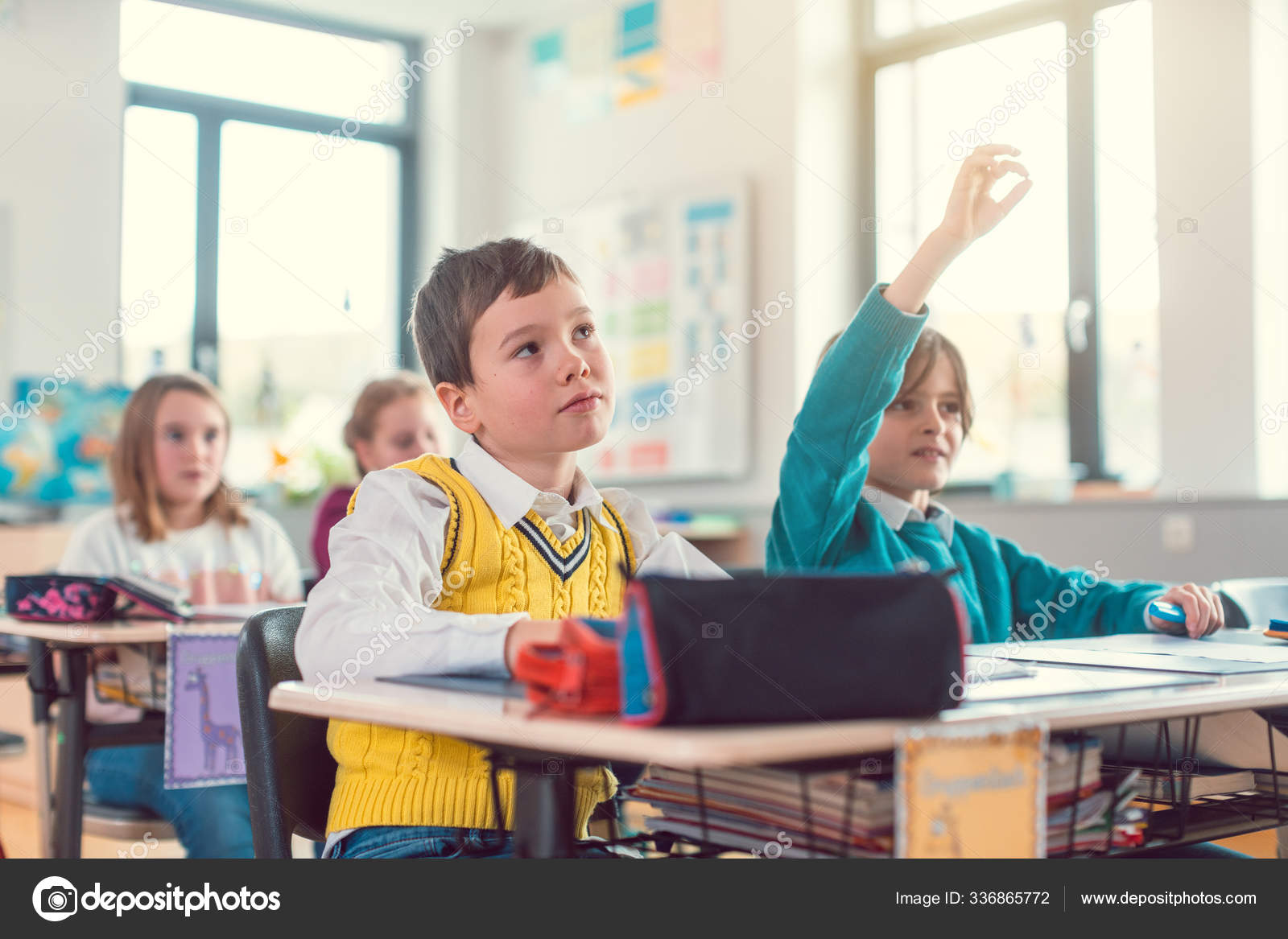 Класса знать. Realia in Classroom. He raised his hand to answer in class.