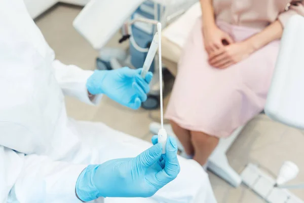 Woman having test for sexually transmitted disease with doctor — Stock Image Woman having test for sexually transmitted disease with doctor Stock Photo